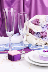 Serving fabulous wedding table in purple color