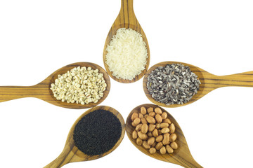 Cereals on wooden spoon