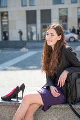 Fototapeta premium Business woman relaxing in street