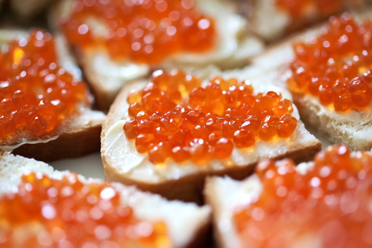 Sandwiches with red caviar . close-up