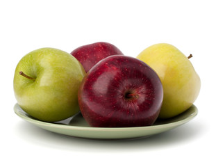 Apples pile on plate