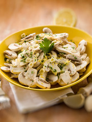 salad with champignon and grated lemon peel, selective focus