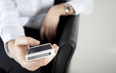 Girl holding mobile phone