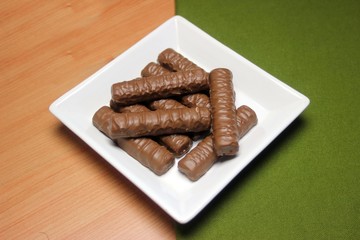 Ceramic plate with chocolate fingers