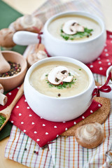 Two bowls of fresh mushroom soup