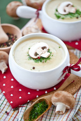 Two bowls of fresh mushroom soup