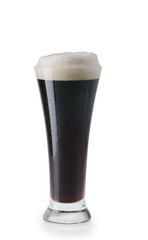 Glass of dark beer with froth