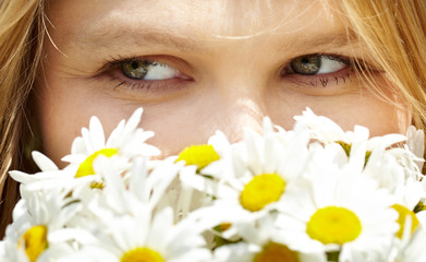 Girl with camomiles.