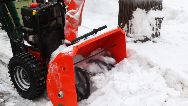 close-up of manual machine that breaks snow lumps