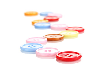 Colorful sewing buttons isolated on white