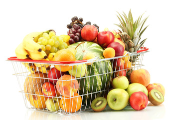 Assortment of exotic fruits in metal basket isolated on white