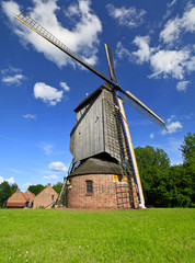 Wind mill during sunny day © sdecoret