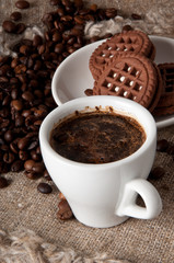 cup of coffee and chocolate cookies 