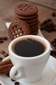 cup of coffee and chocolate cookies 
