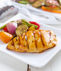 barbecued chicken with fresh vegetable sides