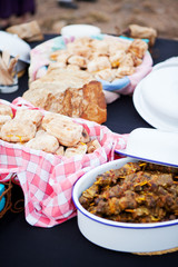 Roasted bread and mutton kebabs in dishes