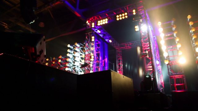 Gate of metal constructions with illumination on stage