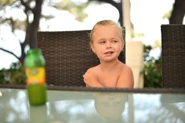 little lovely girl drinking juice