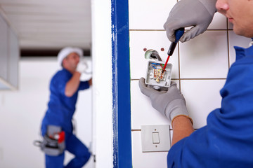 craftsman working on the electricity installation