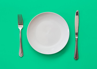 empty plate with knife and fork