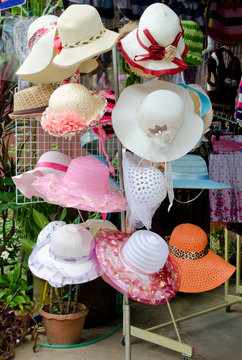 colorful summer hats in shop.