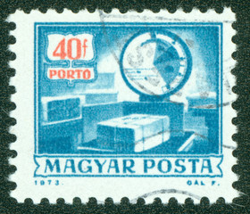 stamp printed by Hungary, shows postal boxes and scales