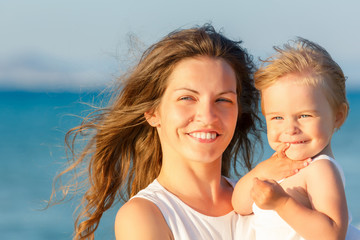 Mother and daughter on the beach