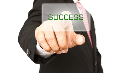 Business hand pushing a button on a touch screen interface