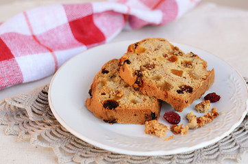 Homemade English cake on small white plate
