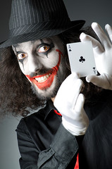 clown with cards in studio shoot