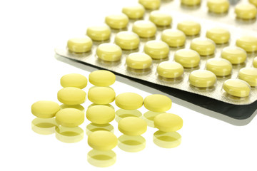 pills packed in blisters, isolated on white