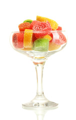 colorful jelly candies in  in cocktail glass isolated on white.