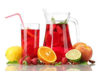 sangria in jar and glass with fruits, isolated on white