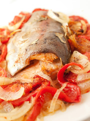 baked  trout with tomatoes and onion for Mediterranean recipe