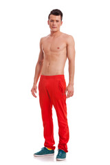 Fototapeta premium young handsome muscular guy looking at the camera