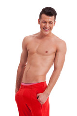 Fototapeta premium muscular male shirtless with hands in pocket