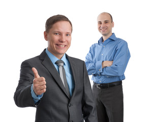 smiling young business man with thumbs up gesture