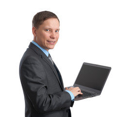 handsome young business man and laptop