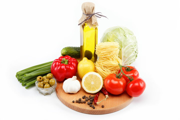 set fresh vegetables with olive oil isolated on white background