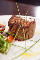 Grilled steak with sauce