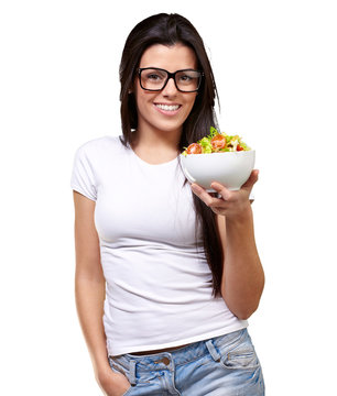 Young Girl Showing A Bowl Of Salad