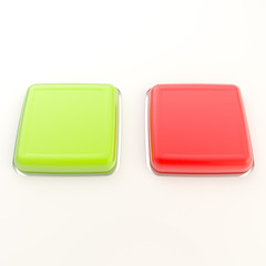 Two red and green glossy buttons over white surface
