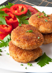 chicken cutlets with vegetables and herbs 