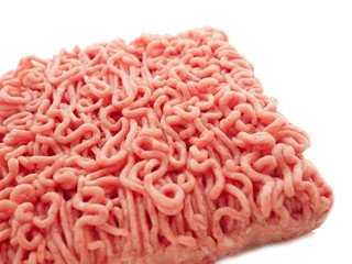 Minced meat  over white closeup