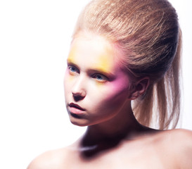 Beautiful blonde woman face with bright colorful make-up