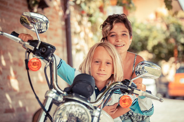 Couple of Children with Motorbike