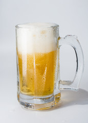 Mug, full of cold lager beer.