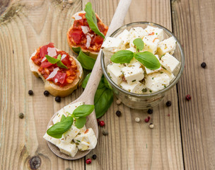 Wooden spoon with Feta and Olives