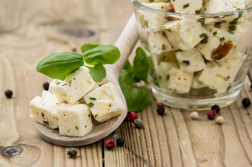 Wooden spoon with Feta and Olives