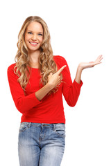 portrait of a beautiful blond lady pointing her finger towards b
